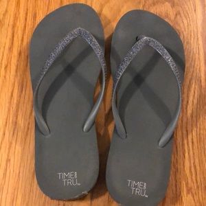 Charcoal grey flip flops